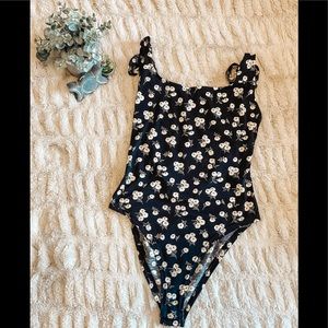 Women’s floral body suit